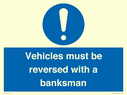vehicles-must-be-reversed-with-a-banksman~